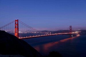 Illuminated Golden Gate Bridge at dusk, San Francisco, California, USA