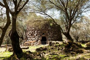 Stone fence of Santa Cristina sacred well in Paulilatino, Oristano, Sardinia, Italy