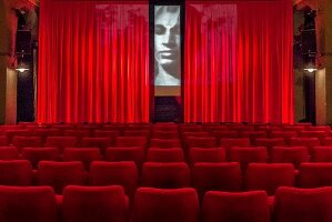 View of red chairs at Apollo Studio in Linden, Hannover, Germany