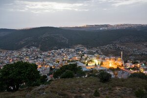 View of illuminated Daburiyya village from Mount Tabor, Nazareth, Israel