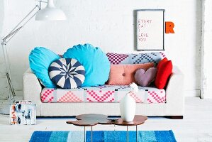 Sofa with colourful upholstery and scatter cushions