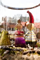 Haus Landegge figurines in a glass