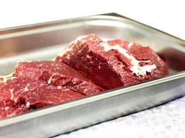 Horse meat in stainless steel tray baking tray