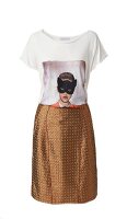 Printed T-shirt and metallic A-line skirt on white background