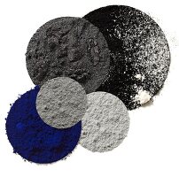 Different shades of eye shadow, gray, anthracite, black and blue on white background
