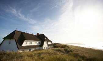 Hotel SOl'ring and green field in Sylt, Germany