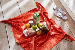 Tetra pack and fruits on cloth