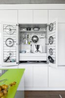 Kitchen closet with various kitchen equipment