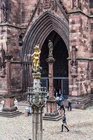 People walking in Freiburg Minster square, Freiburg, Germany