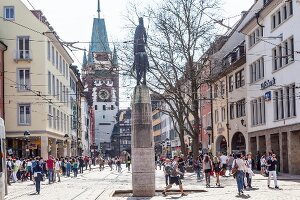 People walking on Kaiser-Josef street in Freiburg, Germany