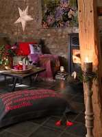 A cosy corner in a fireplace room decorated for Christmas