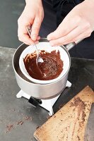 A mini Sacher Bundt cake being made: chocolate being melted
