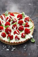 A strawberry tart with basil and lime cream