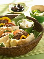 Mini Pita Breads Stuffed with Slider Burgers in a Basket