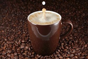 Drops falling into a latte