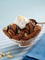 Bowl of Chocolate Ice Cream with Sliced Almonds, Chocolate Sauce and Whipped Cream