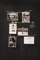 DIY photo wall with decorative tape and chalk on blackboard wall