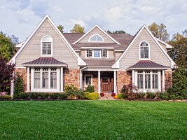 Home with Stone Exterior and a Large Lawn