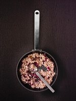 Risotto with red endive in a cast iron pan
