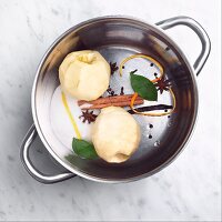 Peeled Quince in a Pot with Poaching Ingredients; From Above