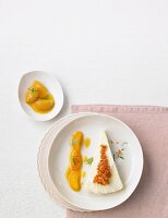 A slice of ricotta parfait with apricot compote