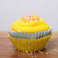 Vanilla cupcake with coloured sugar balls