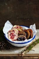 Mini pancakes with berries in a rustic bowl