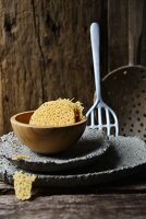 Parmesan crisps in a wooden bowl