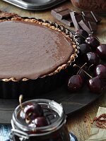 A chocolate tart in the baking tin