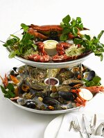 Seafood platter with dips and salad