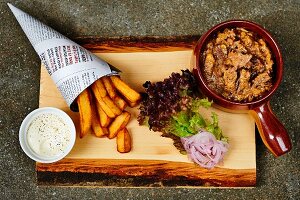 Carbonade flamande (Belgian sweet and sour beef and onion stew made with beer) with chips and mayonnaise