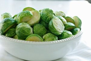 Steamed Brussels sprouts in a white bowl