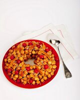 Strufoli (little balls of fried dough, Italy) with candied fruits