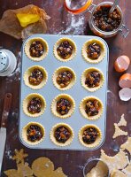 Unbaked mince pie in a baking tin