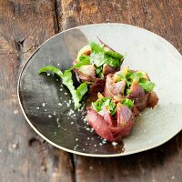 Figs wrapped in bresaola