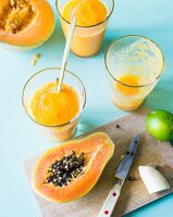 Tropical smoothies made with papaya, melon, banana and lemongrass