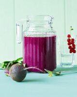 A smoothie made with beetroot, berries and orange