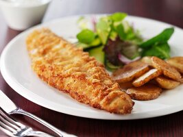 Battered fish with fried potatoes