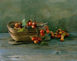 An autumnal arrangement of ornamental apples in baskets