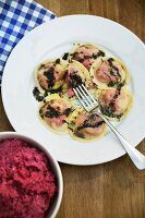 Beetroot ravioli with poppy seed butter