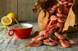 Homemade dill and parsley mayonnaise with cooked prawns