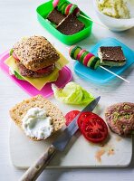ADHD food: pumpernickel sandwich, vegetables skewers and veggie burgers