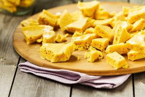 Honeycomb on a wooden plate, England