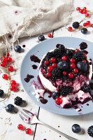 A mini blackberry, blueberry and redcurrant cheesecake