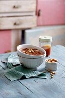 Chocolate pudding with caramel and peanuts