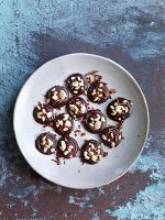 Chocolate bites with almonds and sugar sprinkles