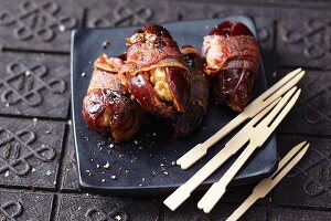 Dates wrapped in bacon