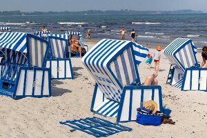 Blue-and-white beach chairs on the beach at Schaabe, Breege-Juliusruh