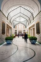 The lobby of the 'Four Seasons' Hotel in the elegant Gresham Palace in Budapest, Hungary