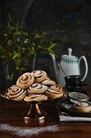 Buns with rose jam and icing sugar for Christmas